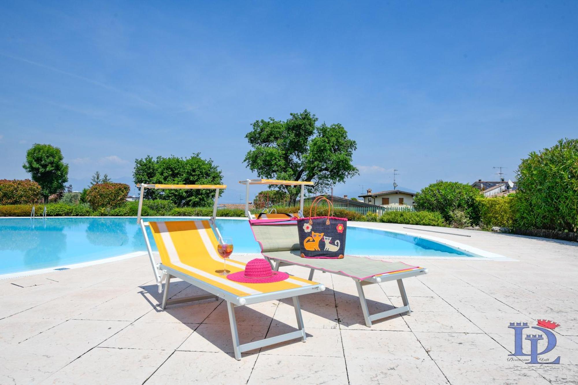 Desenzanoloft Official Partner Marriott Homes & Villas -Butterfly And 5 Pools Family Apartment ديسينسانو ديل غاردا المظهر الخارجي الصورة