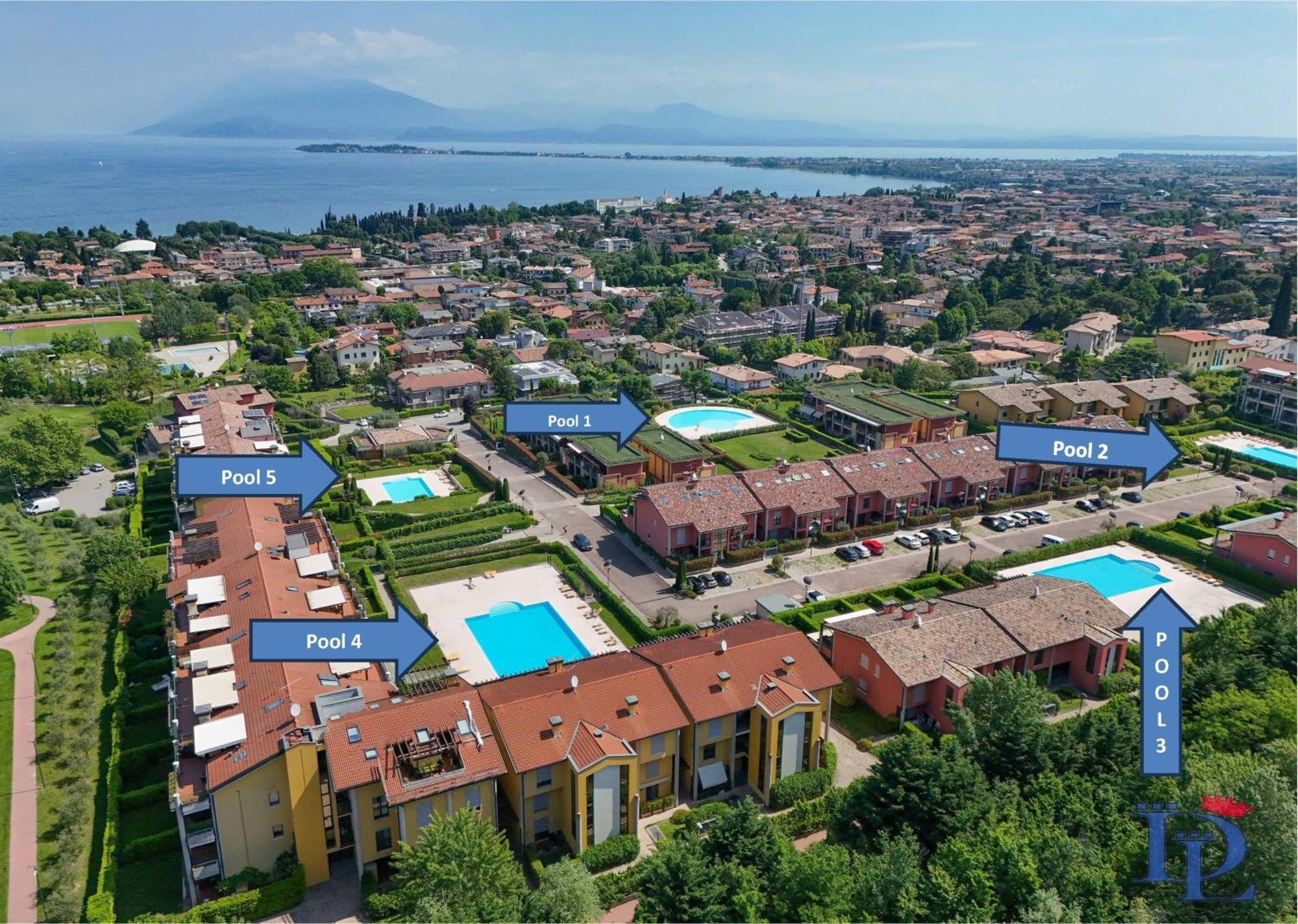 Desenzanoloft Official Partner Marriott Homes & Villas -Butterfly And 5 Pools Family Apartment ديسينسانو ديل غاردا المظهر الخارجي الصورة